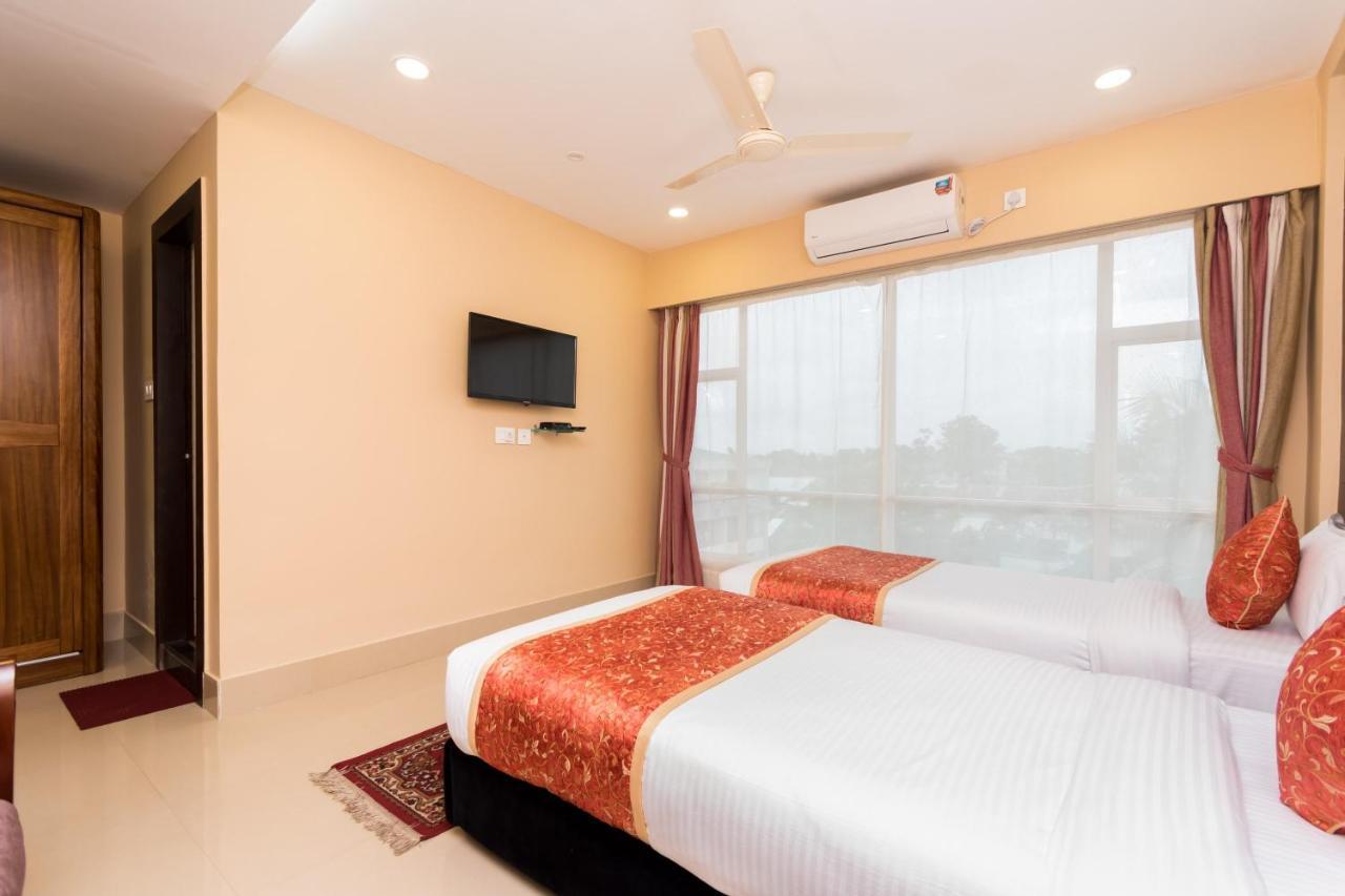 Oyo 9202 Hotel Central Courtyard Siliguri Exterior photo